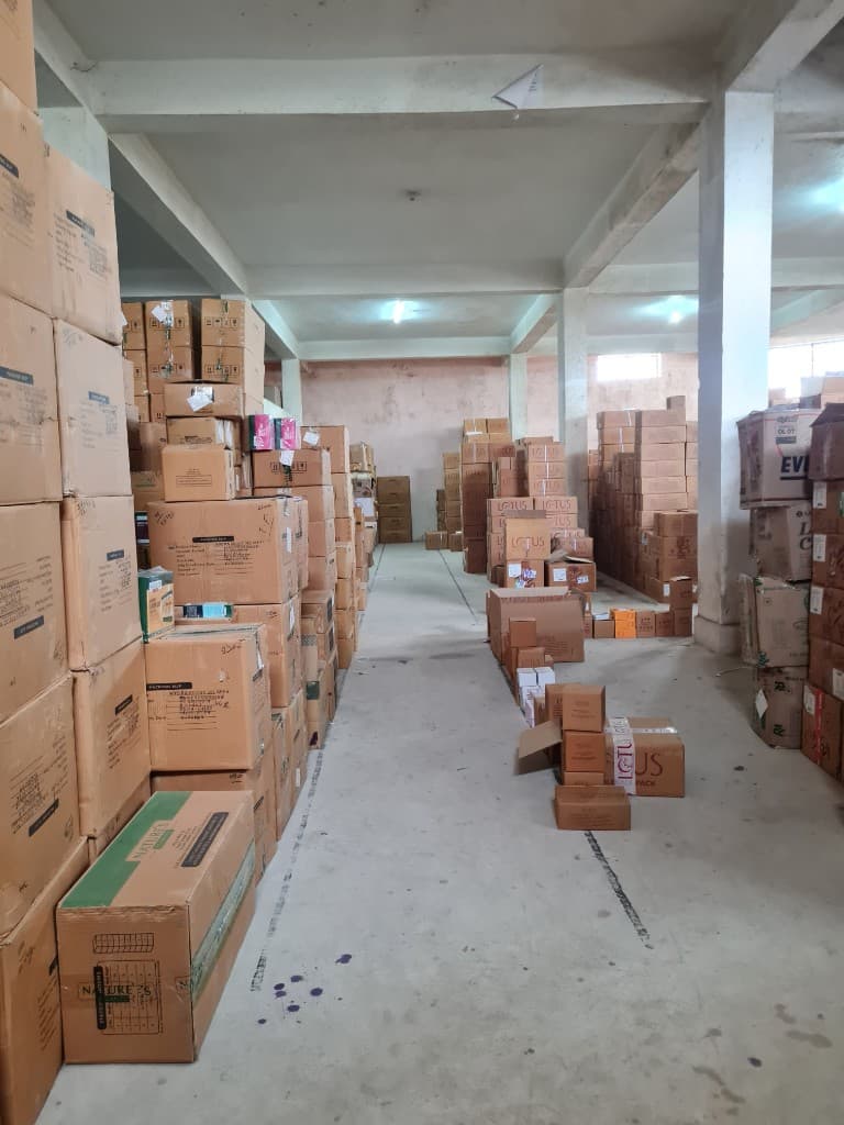 Warehouse storage of boxed consumer products in Ranchi; carton marks are not listed brand partnerships